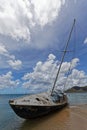 Sainte-Anne, Martinique - Abandoned beached sailboat in Pointe Marin beach