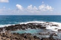 Sainte-Anne, Martinique - Waves in the blue eye hole oeil bleu in FerrÃÂ© Cape