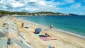 View on beach with people on sunny day