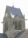 Sainte-Mere-Eglise, FRA, France - August 21, 2022: DDAY Memorial with Paratrooper on bell tower Royalty Free Stock Photo