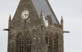 Sainte-Mere-Eglise, FRA, France - August 21, 2022: DDAY Memorial with Paratrooper on bell tower Royalty Free Stock Photo