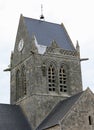 Sainte-Mere-Eglise, FRA, France - August 21, 2022: DDAY Memorial with Paratrooper on bell tower