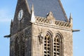 Paratrooper dummy hung from the steeple of the church in Sainte-Mere-Eglise, Normandy