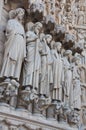 Saints on fasade of The Notre Dame de Paris