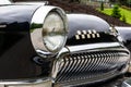 GAZ M21 Volga, third series model, close-up view of headlight and front of the car