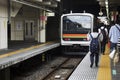 Saitama Rapid Railway stop sending and receive passengers people
