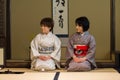 Japanese tea ceremony masters during ceremonial preparation and presentation of powdered green tea matcha Royalty Free Stock Photo