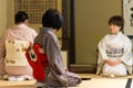 Japanese tea ceremony masters during ceremonial preparation and presentation of powdered green tea matcha Royalty Free Stock Photo