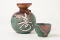 Sake cup and jug Royalty Free Stock Photo