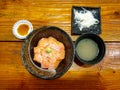 Sake-Don, salmon rice bowl with soy-wasabi sauce. Royalty Free Stock Photo