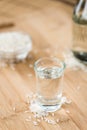 Sake (on wooden background) Royalty Free Stock Photo