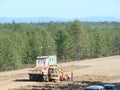 Sakhalin, Russia - Jul 18, 2014: Truck and excavator.