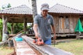 Sakon Nakhon, Thailand - August 6, 2019 : Carpenter Using Electric Sander for wood, Carpenter working