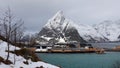 Sakrisoy island and Olstinden mountain at the Reinefjorden on the Lofoten in Norway in winter