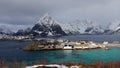 Sakrisoy island and Olstinden mountain at the Reinefjorden on the Lofoten in Norway in winter