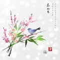 Sakura in blossom, bamboo branch and little bird Royalty Free Stock Photo