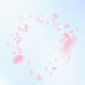 Sakura petals falling down. Romantic pink flowers vignette. Flying petals on blue sky square backgro