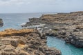 Buracona - The Blue Eye of Cabo Verde, a boy at the rocky