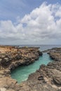 Buracona - The Blue Eye of Cabo Verde, people on the rocks