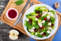 Salad of apple, spinach, mini mozzarella balls, lettuce leaves, Royalty Free Stock Photo