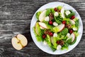 Salad of apple, spinach, mini mozzarella balls, lettuce leaves, Royalty Free Stock Photo