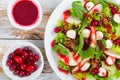 Salad of apple, spinach, mini mozzarella balls, lettuce leaves, Royalty Free Stock Photo