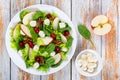 Salad: apple, spinach, mini mozzarella balls, lettuce, walnuts