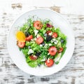 Salad. Salad of arugula, blue cheese, strawberries and blueberries. Royalty Free Stock Photo