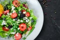 Salad. Salad of arugula, blue cheese, strawberries and blueberries. Royalty Free Stock Photo