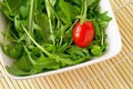 Salad with arugula and cherry tomato Royalty Free Stock Photo