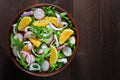 Salad with arugula, radish and tangerine