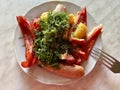 Salad with arugula, red sweet pepper, yellow tomatoes and balsamic vinegar, olive oil. Sausage and salad. Breakfast idea Royalty Free Stock Photo