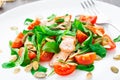 Salad with arugula, salmon and cherry tomato