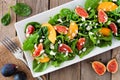 Salad of arugula, spinach, figs and goat cheese, overhead scene Royalty Free Stock Photo