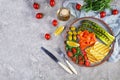 Salad with asparagus, grilled halloumi cheese, salmon fillet, tomatoes, arugula and green olives. Top view Royalty Free Stock Photo