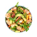 Salad with avocado, shrimp and arugula. Top view