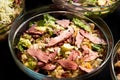 Salad with bacon meat slices lettuce leaves fresh paprika tomatoes