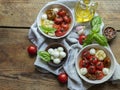 Salad. Baked tomato, basil, garlic with mozzarella cheese in ceramic dishes. cooking, cooked dish