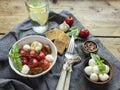 Salad. Baked tomato, basil, garlic with mozzarella cheese in ceramic dishes. cooking, cooked dish