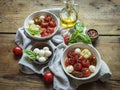 Salad. Baked tomato, basil, garlic with mozzarella cheese, ceramic dishes. cooking, cooked dish, top view