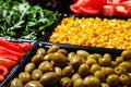 Salad bar with different fresh ingredients as background, closeup Royalty Free Stock Photo