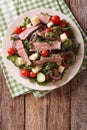 Salad with beef steak, cheese and vegetables dressed with chimic Royalty Free Stock Photo
