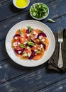 Salad with beets, oranges and soft cheese on a white plate Royalty Free Stock Photo