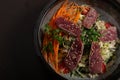 Salad bowl with tuna tataki. Asian cuisine. View from above