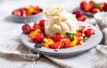 Salad with burrata cheese, cherry tomatoes and strawberry with microgreen and olive oil. Traditional Italian burrata cheese. Royalty Free Stock Photo