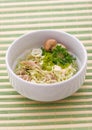 Salad with cabbage leaves and mushrooms in white bowl. close up