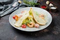 salad caesar with shrimps on plate on dark concrete table Royalty Free Stock Photo