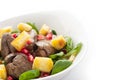 Salad with chicken liver and spinach in the white plate horizontal Royalty Free Stock Photo