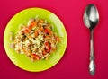 Salad with chicken stomachs with vegetables carrots, onions, peppers, cabbage, tomato, broccoli . salad with chicken on a green Royalty Free Stock Photo