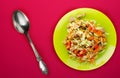 Salad with chicken stomachs with vegetables carrots, onions, peppers, cabbage, tomato, broccoli . salad with chicken on a green Royalty Free Stock Photo